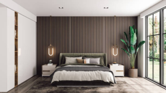 Interior of a modern luxury bedroom with garden view.