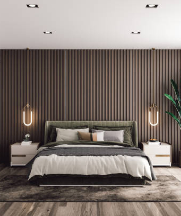 Interior of a modern luxury bedroom with garden view.